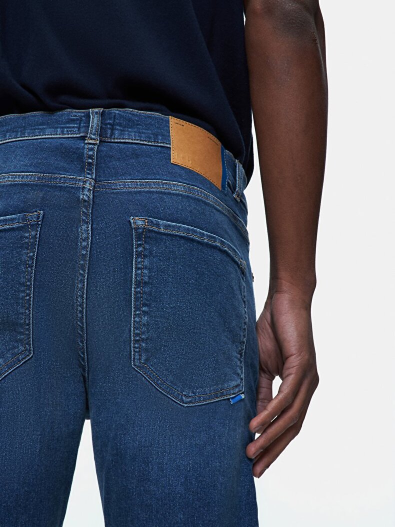 Jumy 5 Tapered Leg Mid Waist Jean Trousers